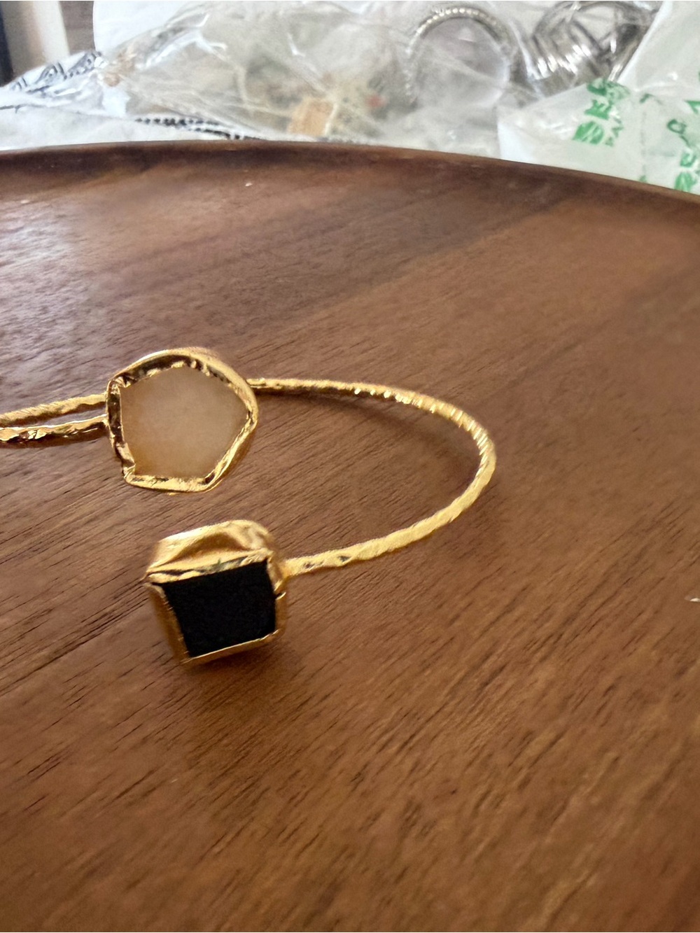Gold Open Cuff Bracelet with Black and Cream Stone Accents